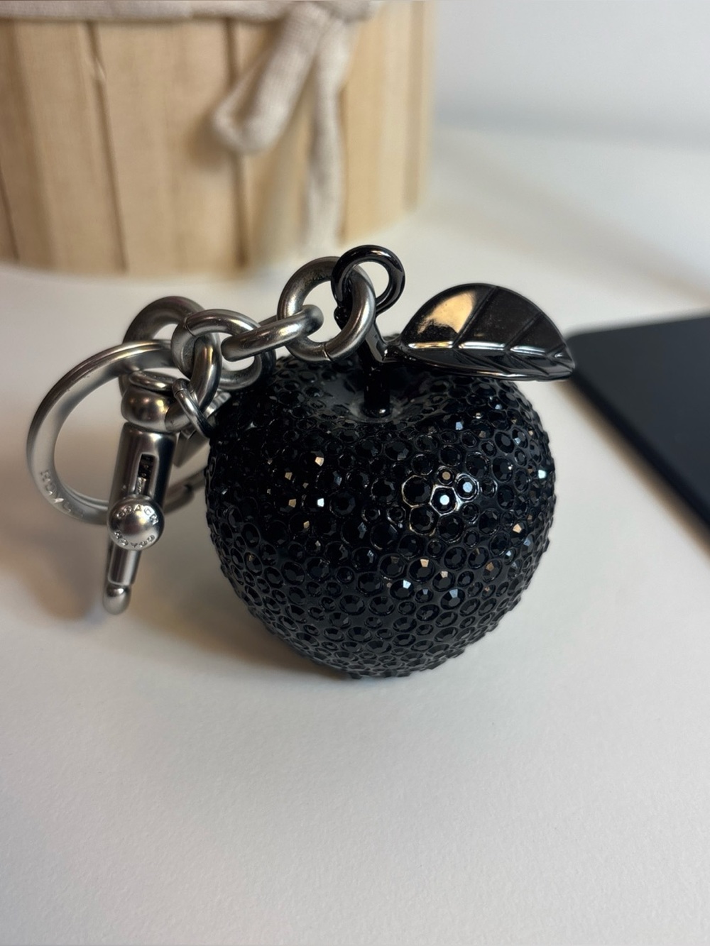 Coach black crystal apple charm